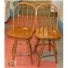 Image 1 : LOT OF 2 SWIVEL STOOLS WITH BACKS. SOLID WOOD.