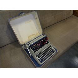 EVERETT TYPEWRITTER IN CASE