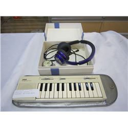 YAMAHA MINI KEYBOARD, HEADPHONES, AND POCKET WATCH