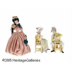 TWO GERMAN PORCELAIN FIGURINES AND AN AMERICAN FI