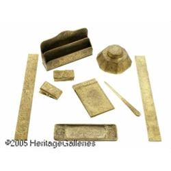 AN AMERICAN GILT BRONZE 'ZODIAC' DESK SET RTiffan