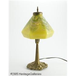 A CONTINENTAL GLASS AND METAL LAMP Rattributed to