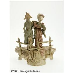A CONTINENTAL FIGURAL GROUP ON A SHELL STAND RRoy