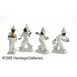 FOUR CONTINENTAL PORCELAIN BLACKAMOOR FIGURINES R