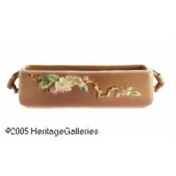 AN AMERICAN 'APPLE BLOSSOM' POTTERY PLANTER RRose