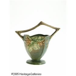 AN AMERICAN BLUE 'BUSHBERRY' POTTERY BASKET RRose