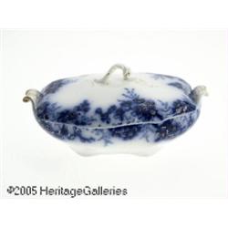 AN ENGLISH PORCELAIN FLOW BLUE COVERED VEGETABLE 