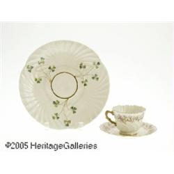 AN IRISH PORCELAIN CUP, SAUCER AND PLATE RBelleek