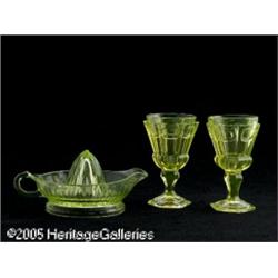 A PAIR OF AMERICAN VASELINE GLASS GOBLETS AND JUI