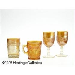 A GROUP OF AMERICAN OPALESCENT MARIGOLD PRESSED G