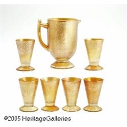 AN AMERICAN MARIGOLD 'CRACKLE' CARNIVAL GLASS WAT