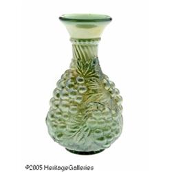 AN AMERICAN IMPERIAL 'GRAPE' CARNIVAL GLASS CARAF