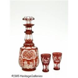 AN ETCHED RUBY GLASS DECANTER AND TWO CORDIALS RM