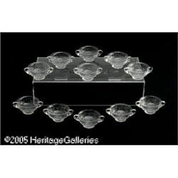 A SET OF ELEVEN CUT GLASS PUNCH CUPS RH. P. Sincl