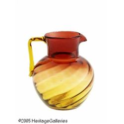 AN AMERICAN SWIRL PATTERN AMBERINA GLASS PITCHER 