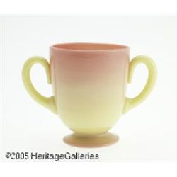 AN AMERICAN GLOSSY FINISH BURMESE GLASS TWO HANDL