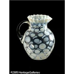 AN OPALESCENT COIN SPOT PATTERN GLASS PITCHER RMa