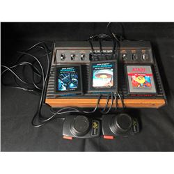 ATARI VIDEO GAME SYSTEM W/ GAMES & CONTROLLERS
