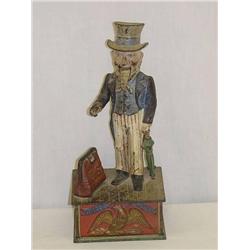 CAST IRON UNCLE SAM MECHANICAL COIN BANK - SOME P