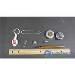 Fountain Pen, 2 Measuring Tapes, 7up Cap, etc.