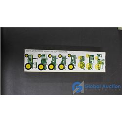 Eight John Deere Miniature Toy Tractors 1892-1973