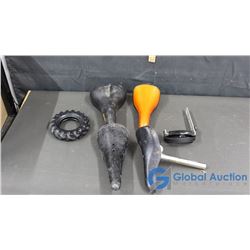 4 Bicycle Seats, Firestone Advertising Tire, and Camera Holder