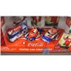 Image 2 : 7 Coca Cola Collector Bottles & Poster Car Collection (NIB)