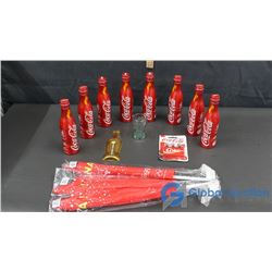 8 Coca Cola Collector Bottles, 3 Car Flags, Mini Glass, Thermometer & Magnets