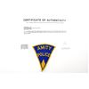 Image 2 : Jaws (1975) - â€˜Amity Policeâ€™ Uniform Patch.Triangular cotton costume patch, bearing â€˜Amity Pol
