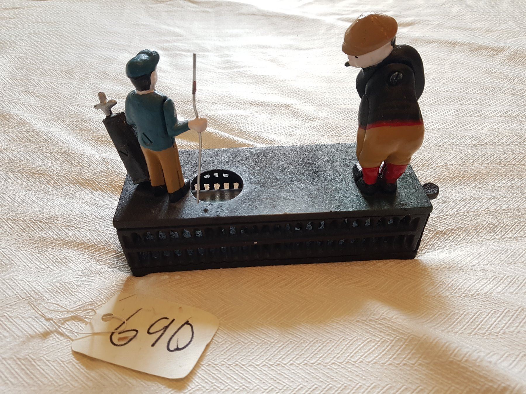 CAST IRON MECHANICAL PIGGY BANK (GOLF)