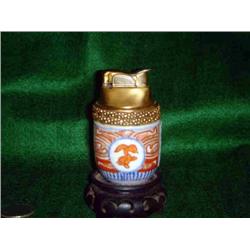 EVANS TABLE LIGHTER POTTERY ON WOODEN STAND