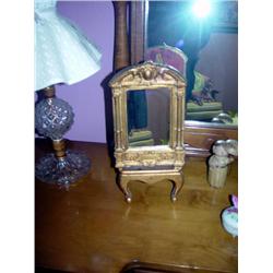 GOLD MIRROR ON EASEL