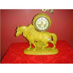 YELLOW METAL HORSE CLOCK