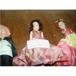 2 SMALL DOLLS IN PEACH & PURPLE DRESSES