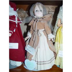 BLONDE DOLL IN FADED CLOAK IN