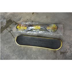 2 BLACK AND YELLOW PLASTIC SNOWBOARDS