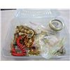 Image 1 : SMALL PLASTIC TOTE OF COSTUME JEWELERY