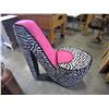 Image 1 : ZEBRA HIGH HEEL STORAGE CHAIR