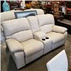 Image 1 : ASHLEY FLOOR MODEL CREAM GENUINE LEATHER POWER RECLINING AND ROCKING LOVESEAT WITH CONSOLE RETAIL $2