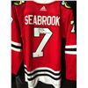 Image 1 : BRENT SEABROOK SIGNED BLACK HAWKS JERSEY (FRAMEWORTH HOLO)