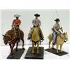 Image 1 : 3 Hand-Carved cowboys done in Casper, Wyoming in 