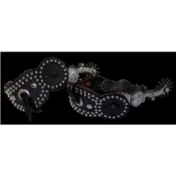 Fancy Silver mounted Spurs with studded straps
