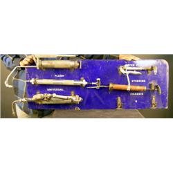 Blue porcelain grease gun rack with 6 tools