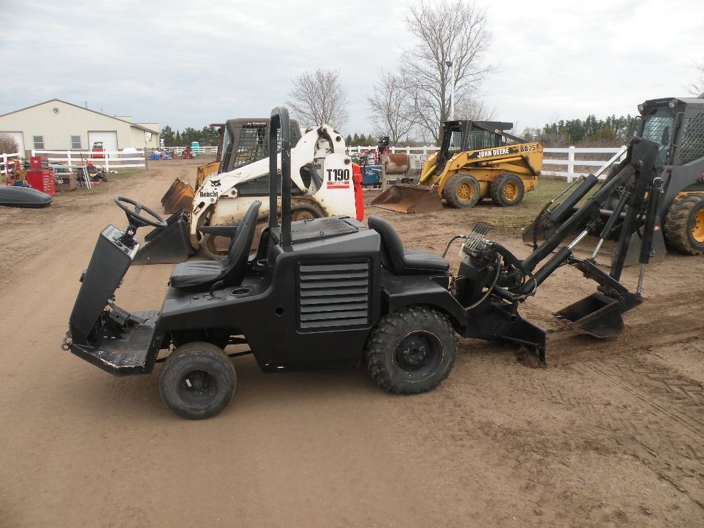 Tennant rubber tire backhoe