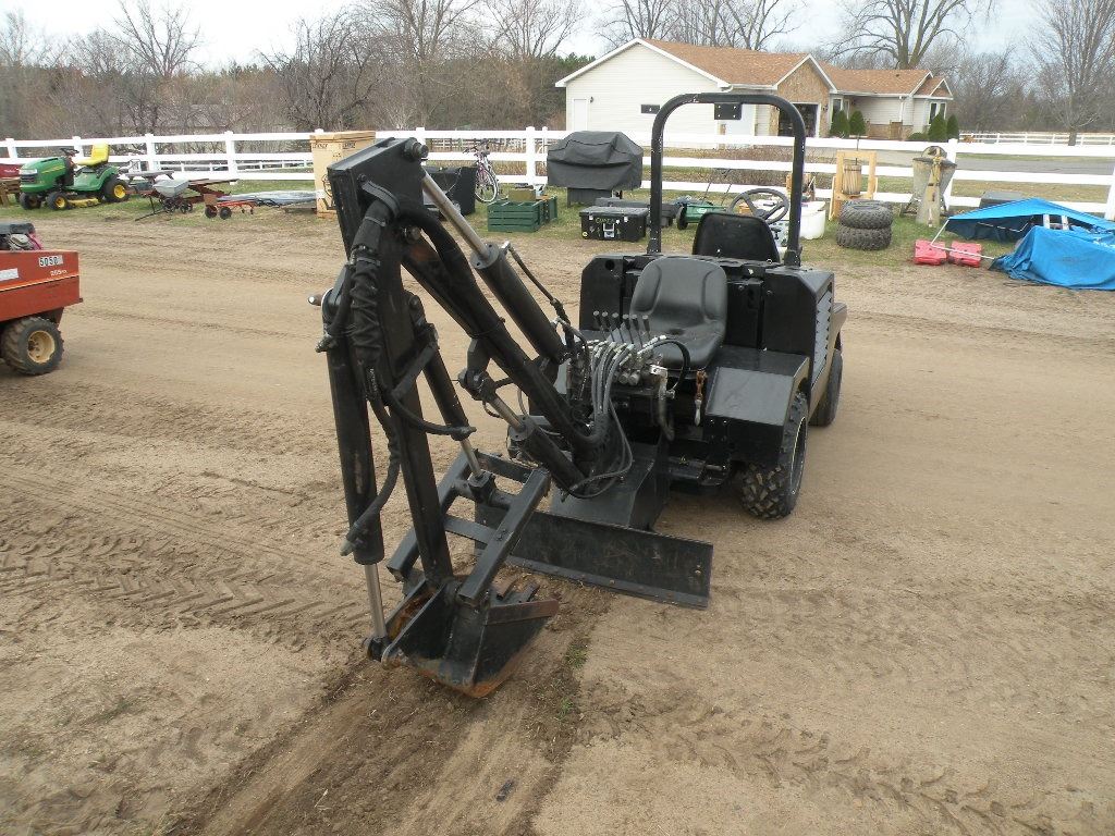 Tennant rubber tire backhoe