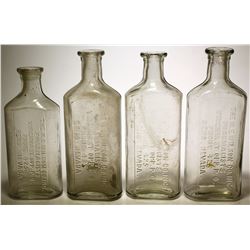 Four N. E . Wilson Co. Bottles  (57729)