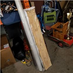 BOX OF HARDWOOD FLOORING, THE VAPOR BARRIER, AND OTHER VARIOUS ROLLS