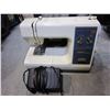 Image 2 : KENMORE 24 STITCH SEWING MACHINE W/ ROLLING TAN TRAVEL CASE