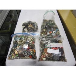 4 LARGE BAGS OF JEWELERY