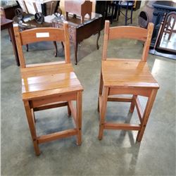 PAIR OF RECLAIMED WOOD WORKS PINE STOOLS